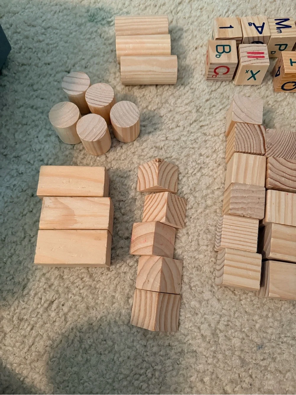 Plain wooden block set, approximately 50 blocks